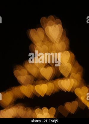 Bokeh lights, in the shape of little hearts Stock Photo
