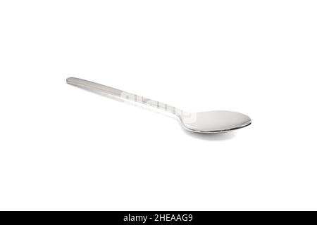 Clean shiny metal spoon isolated on white. Stainless steel small kitchen dessert teaspoon cut close up. Tablespoon. Kitchen utensils concept Stock Photo