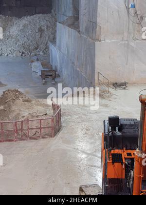 Marble Quarry with working tools inside the Mountain in Carrara, Tuscany - Italy. Stock Photo