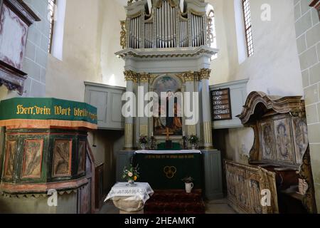 Viscri, Romania - October 29, 2021: Inside of the the Viscri fortified church. Stock Photo
