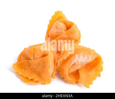 Raw tortellini stuffed with salmon isolated on white background Stock Photo