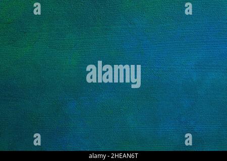 Unevenly colored wooden board. Colorful dark blue-green painted wooden background.   Flat lay. Stock Photo