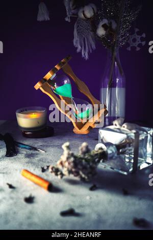 dramatic lit image of hourglass, time concept Stock Photo