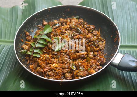 Clam meat fry kerala style kakka irachi fry Stock Photo