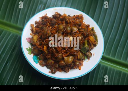 Clam meat fry kerala style kakka irachi fry Stock Photo