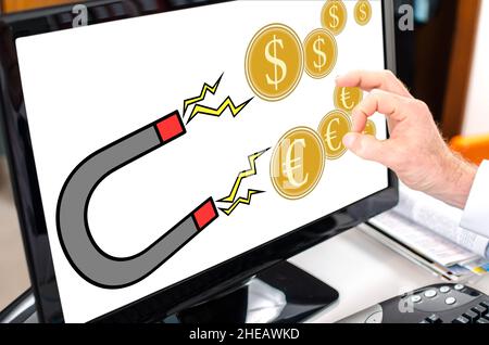 Money attraction concept shown on a computer screen Stock Photo