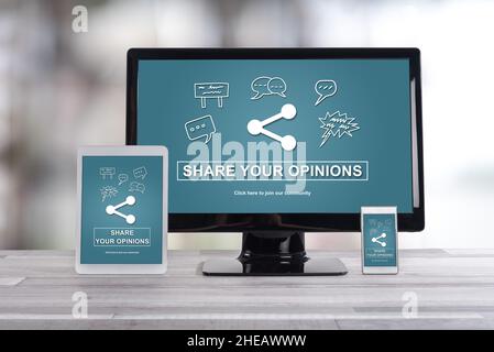 Opinions sharing concept shown on different information technology devices Stock Photo