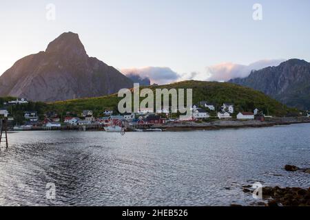 Scenic panorama view of norwegian beautiful nature and small fishing villages with typical rorbu wooden red cabins in Lofoten, northern Norway Stock Photo