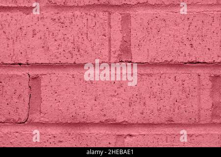 Close up of a pink brick wall. Pacific Pink Textured Background. Stock Photo