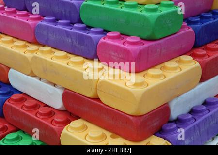colorful stacked plastic building blocks for children Stock Photo