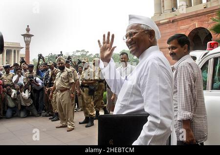 Civil society activists Anna Hazare come out after the Lokpal Bill drafting committee meeting at North Block of Indian Govt Office in New Delhi. Stock Photo