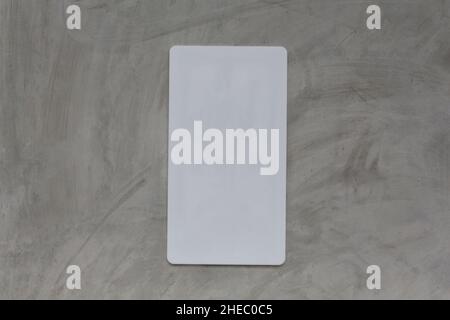 Empty white plastic sign on a vintage wall and have copy space. Stock Photo