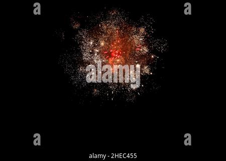 Fireworks in the sky against on black background, copy space for text - isolated Stock Photo