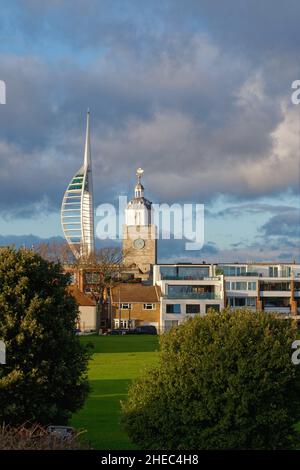 The Spinnaker Tower looming over the skyline of old Portsmouth illuminated by a dramatic winter sunset, Hampshire England UK Stock Photo