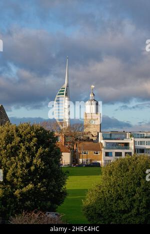 The Spinnaker Tower looming over the skyline of old Portsmouth illuminated by a dramatic winter sunset, Hampshire England UK Stock Photo