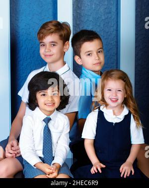 Kids with different school uniforms - November 2020 -Doha QATAR Stock Photo