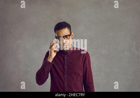 Shocking news on the phone, surprised the guy got amazing news on the phone. Stock Photo
