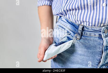 close up of woman showing empty pockets Stock Photo
