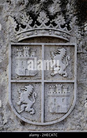 Stone heraldic coat of arms on a wall in Cuellar, Segovia. Stock Photo