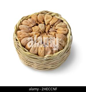 Traditional dried Turkish figs in a basket close up isolated on white background Stock Photo