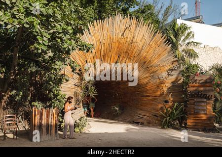 Mexico, Quintana Roo, Tulum, wooden sculpture at the entrance of a hotel Stock Photo