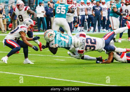 New England Patriots' DeVante Parker, right, against Baltimore Ravens'  Jalyn Armour-Davis, center, and Chuck Clark, left, during an NFL football  game, Sunday, Sept. 25, 2022, in Foxborough, Mass. (AP Photo/Paul  Connors).(AP Photo/Paul