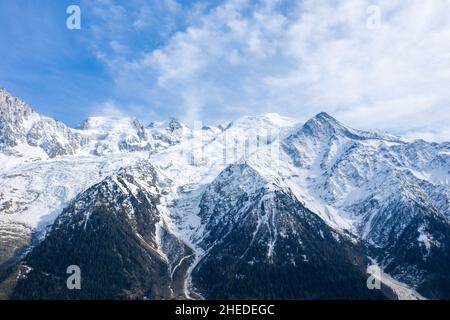 This landscape photo was taken in Europe, in France, in the Alps, towards Chamonix, in the spring. We can see the imposing Mont Blanc massif, under th Stock Photo