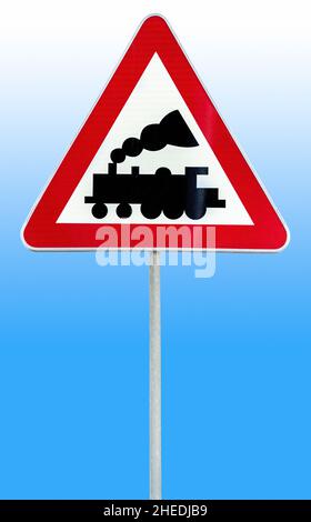 Railroad Level Crossing Sign without barrier or gate ahead the road Stock Photo