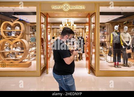 A shopper walks past the American fashion brand Tory Burch store in Hong  Kong. (Photo by Budrul Chukrut / SOPA Images/Sipa USA Stock Photo - Alamy