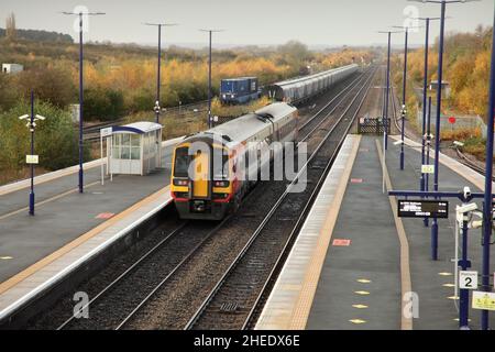 East Midlands Railway Class 158 Express Sprinter diesel multiple unit no. 158854 leaving Barnetby station, Lincolnshire, UK on 17/11/2021. Stock Photo