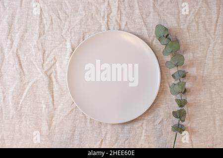 White colored circle shaped ceramic plate on isolated background, food mockup Stock Photo