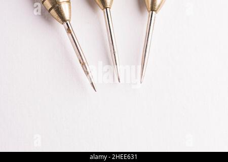 Three arrows dart tips on white with text space Stock Photo