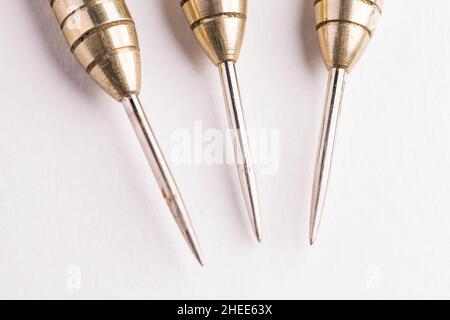 Three arrows dart tips on white with text space Stock Photo