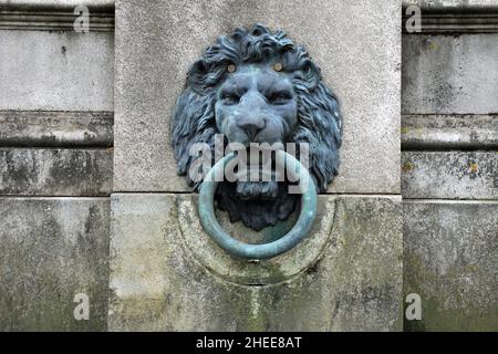 Lions head mooring ring at Victoria Embankment in London sculptured by Timothy Butler Stock Photo