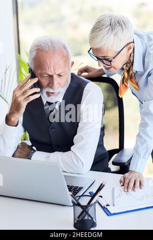 senior busniess people talking office communication Stock Photo