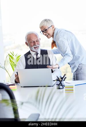 senior busniess people talking office communication Stock Photo