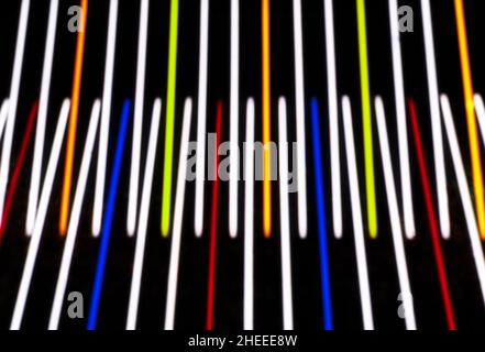 Abstract multicolored glowing abstract stripes on isolated black background. Design for background, banner, presentation template. Stock Photo
