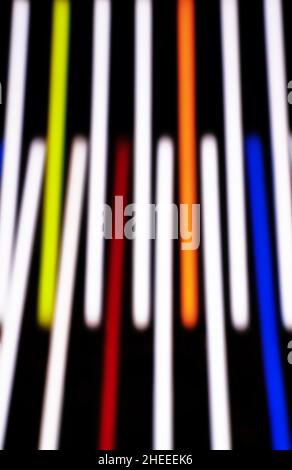 Abstract multicolored glowing abstract stripes on isolated black background. Design for background, banner, presentation template. Stock Photo