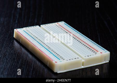 Electronics breadboard for prototyping circuits Stock Photo - Alamy
