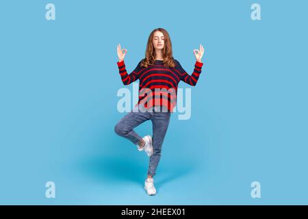Thankful Female Standing Pose Studio Concept Stock Photo - Alamy