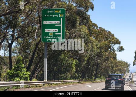 A road sign on the B65 Appin Road approaching Bulli and the M1 Princes Motorway in New South Wales Stock Photo