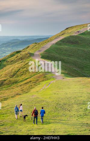 Malvern Worcestershire,England-June 01 2021:Visitors to this popular beauty spot,enjoy exercising and taking in the beautiful views from the various h Stock Photo