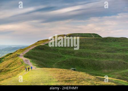 Malvern Worcestershire,England-June 01 2021:Visitors to this popular beauty spot,enjoy exercising and taking in the beautiful views from the various h Stock Photo