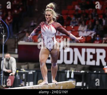 Norman, OK, USA. 9th Jan, 2022. Alabama's Emily Gaskins smiles during her balance beam routine at the NCAA gymnastics meet between the Alabama Crimson Tide and the Oklahoma Sooners at the Lloyd Noble Center in Norman, OK. Kyle Okita/CSM/Alamy Live News Stock Photo