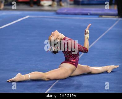 Norman, OK, USA. 9th Jan, 2022. Oklahoma's Carly Woodard displays her flexibility during her floor routine at the NCAA gymnastics meet between the Alabama Crimson Tide and the Oklahoma Sooners at the Lloyd Noble Center in Norman, OK. Kyle Okita/CSM/Alamy Live News Stock Photo