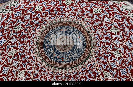 Ancient Ottoman patterned tile composition with some verses in Arabic from Holy Quran in Sultan Ahmet, Istanbul, Turkey. Stock Photo