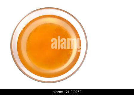 Kombucha in a glass cup on a white background,healthy and delicious drink top view Stock Photo