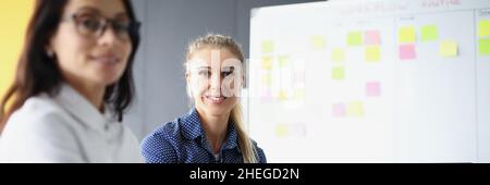 Smiling female on working place Stock Photo