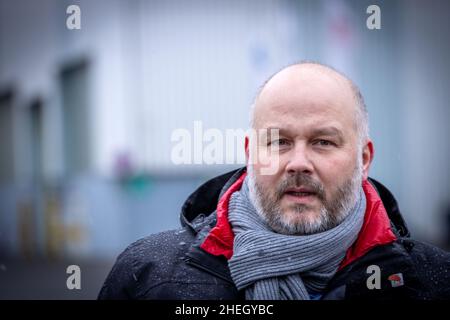 Wismar, Germany. 07th Jan, 2022. Daniel Friedrich, District Manager of IG Metall Küste, after a staff meeting at MV Werft. The continued existence of MV Werften is acutely endangered, and employees' wages could not be paid as planned. The federal government, the state and the shipyard owner Genting Hong Kong have so far been unable to agree on a new rescue package. Credit: Jens Büttner/dpa-Zentralbild/ZB/dpa/Alamy Live News Stock Photo