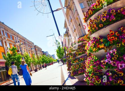 Siauliai city landmark boulevard avenue with people walking in sunny day. Travel destination Lithuania Stock Photo